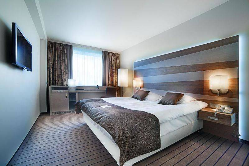 Фотографии номера Улучшенный двухместный номер с 1 кроватью в Гостинице Русотель Москва