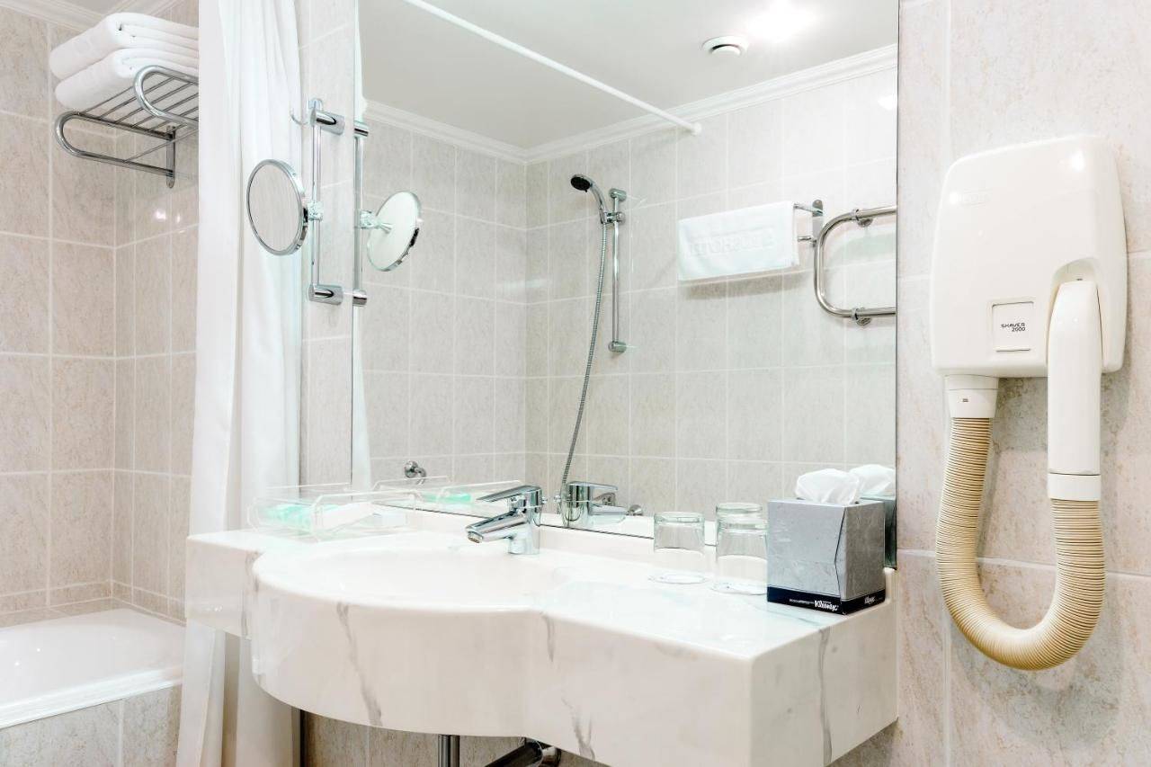 Фотографии номера Люкс с кроватью размера «king-size» в Гостинице Русотель Москва